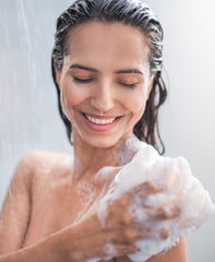 take a warm bath or shower to hydrate dry skin