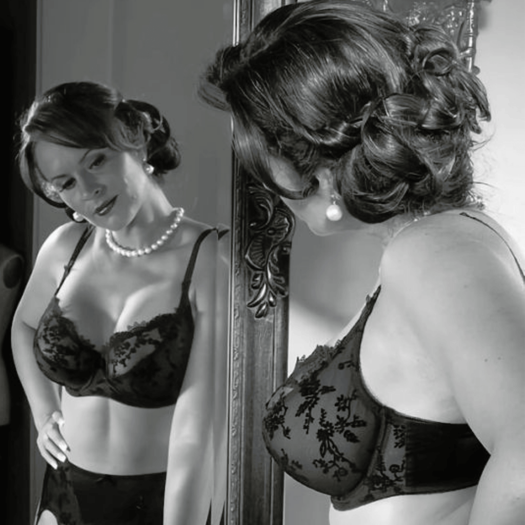 a woman wearing a fitted black bra