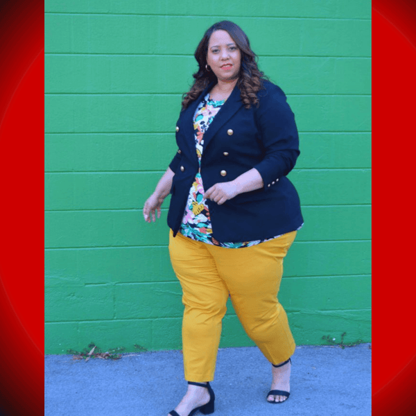 woman in a tailored blazer and dress pants