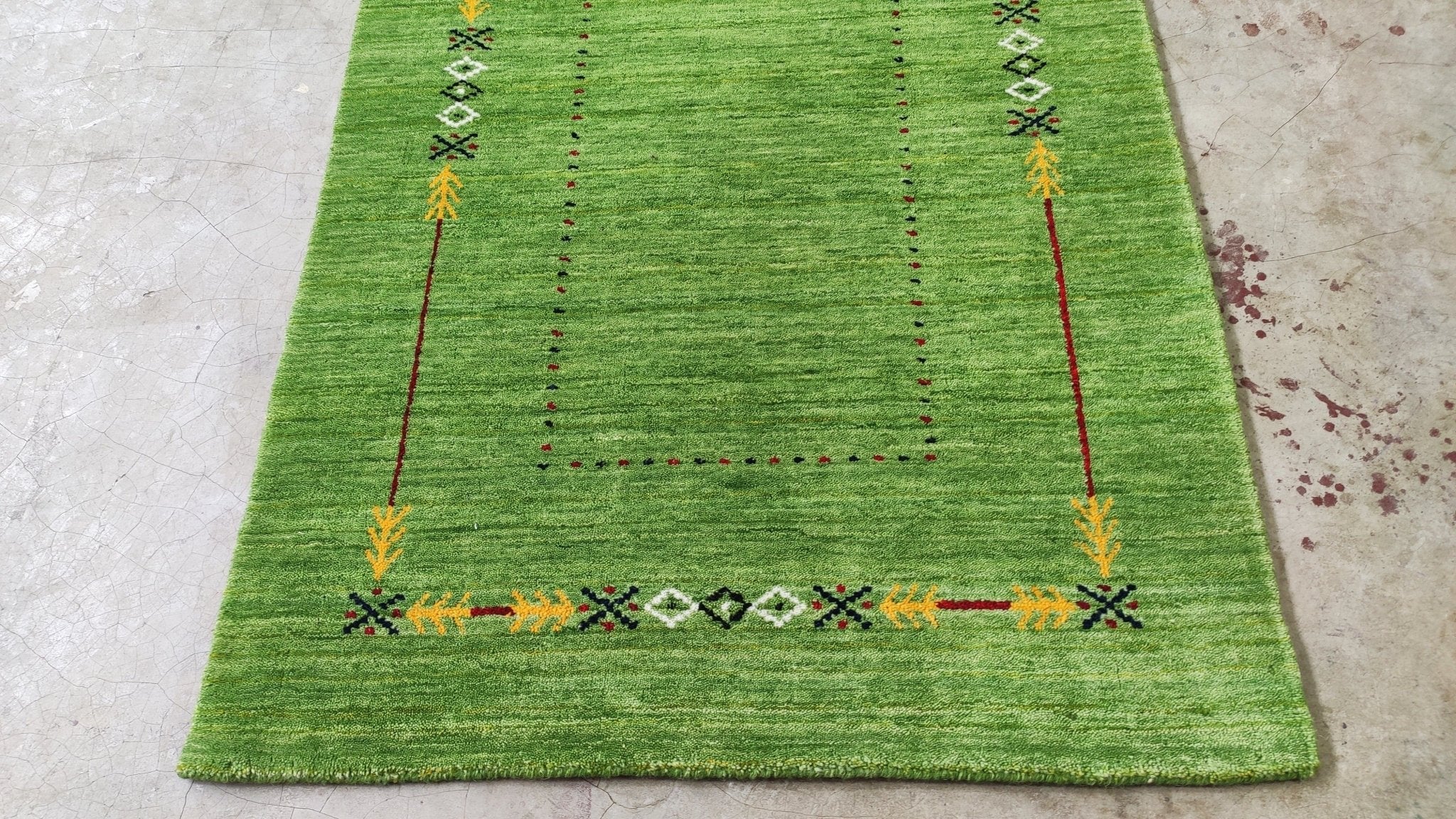 https://cdn.shopify.com/s/files/1/0257/9169/2836/products/3x49-green-handwoven-gabbeh-rug-774931.jpg?v=1692008697