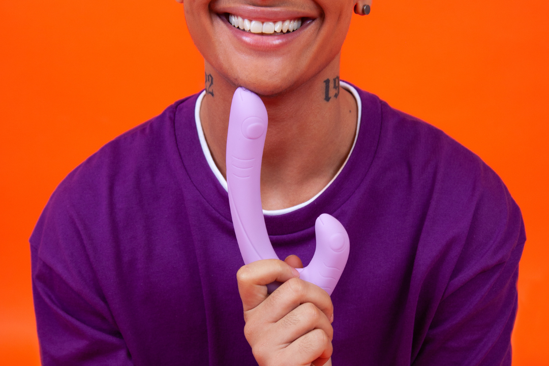 smiling person holding Jix Lavender