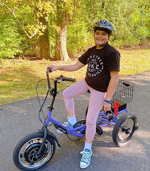 For Allison Heinrich, an 11-year-old with spinal muscular atrophy, having an electric bike allows her to feel like a normal kid again.