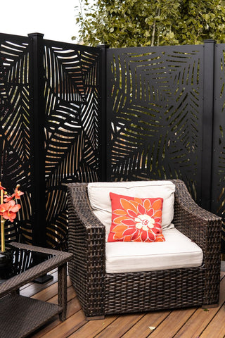 outdoor patio furniture chair of synthetic wicker on backyard deck