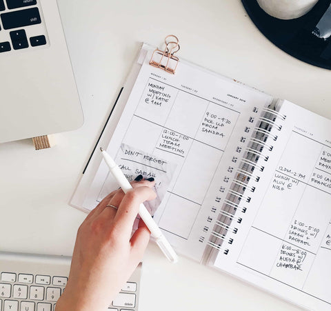 agenda planner and notebook for being productive at work