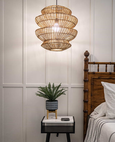 modern farmhouse bedroom with rattan light fixture