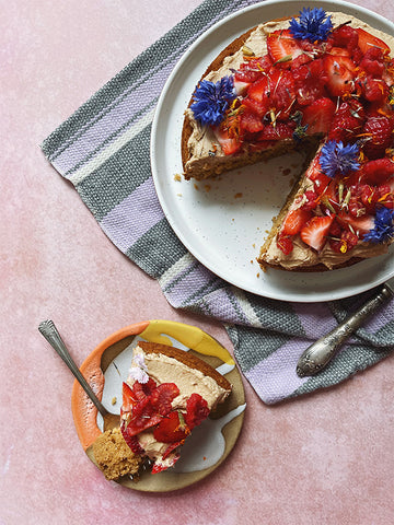 Overview of Delicious Cake in Setting with a Slice Cut Out and On a Separate Plate