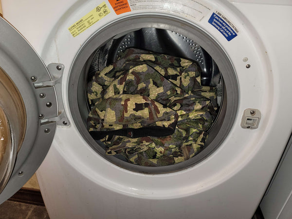 How do you wash hunting clothes?