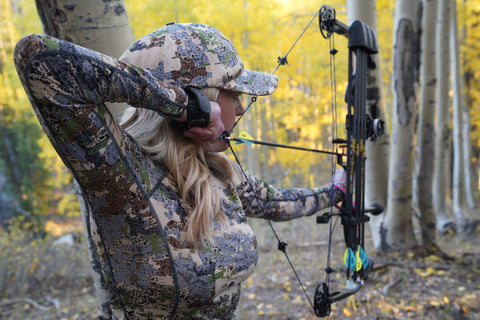 woman bow hunting