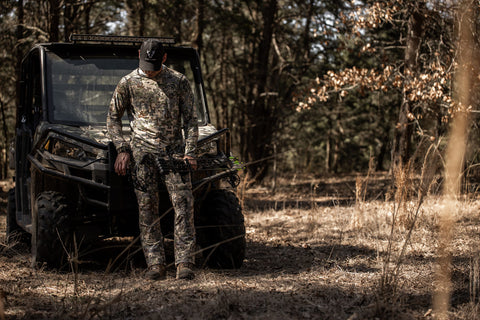 hunter in the woods during early season deer hunting