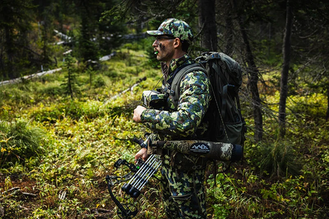 Hunter wearing FORLOH Merino Wool Hunting Jacket in Camouflage