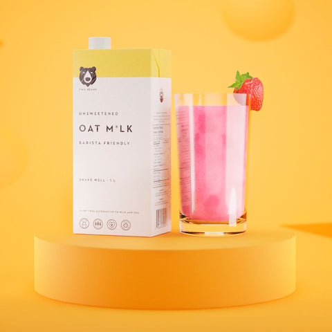 Carton of oat milk with smoothie