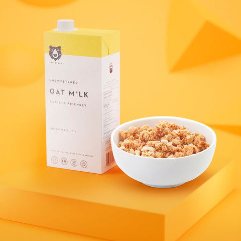 Two Bears Oat Milk with a bowl of cereal