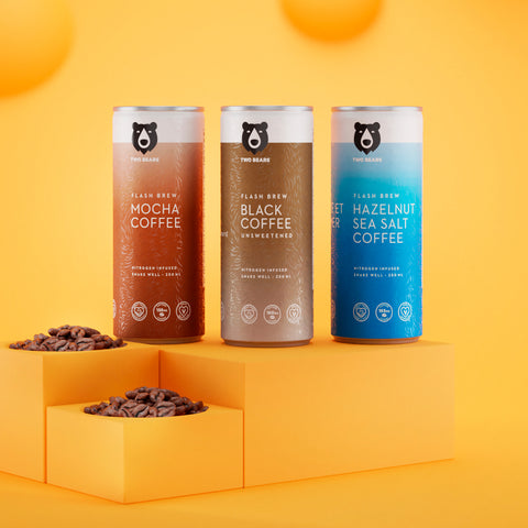 Three cans of Two Bears coffee; Hazelnut & Sea Salt, Mocha, Black Coffee