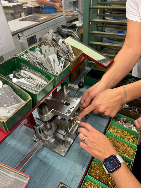 Assembling a Swiss Army Knife at the Victorinox Factory in Switzerland
