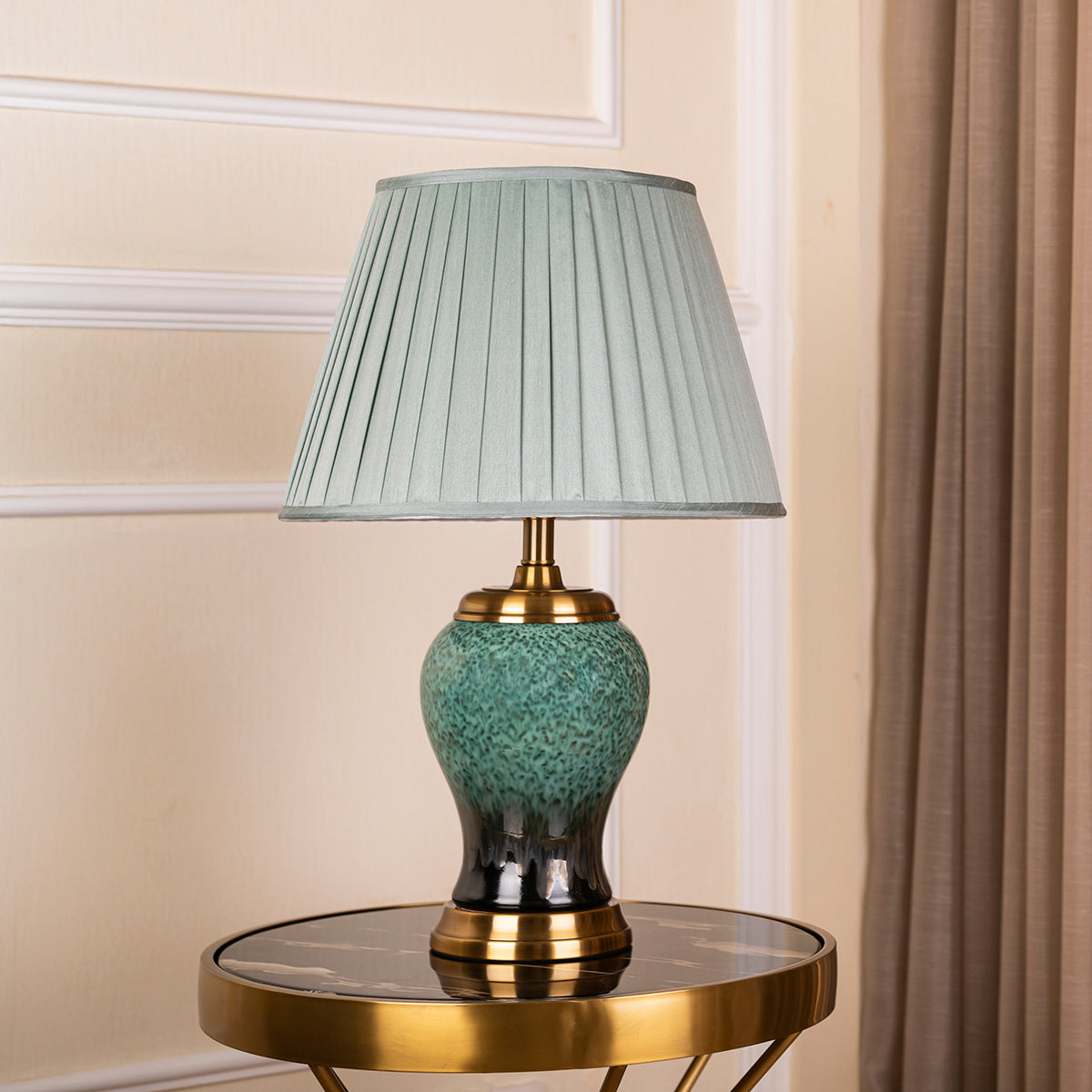 teal and silver table lamp