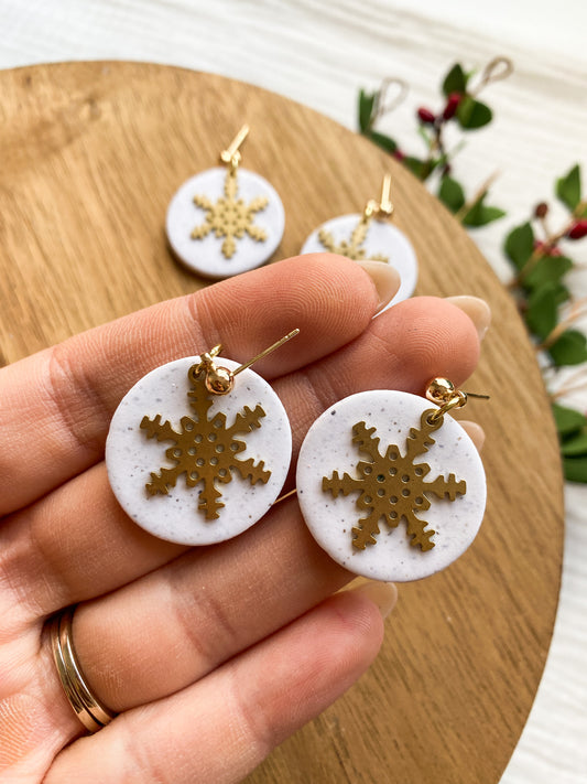 Snowflake earrings with blue Swarovski crystals... - Folksy