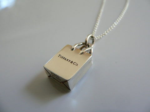 Tiffany & Co.® shopping bag charm in sterling silver with enamel