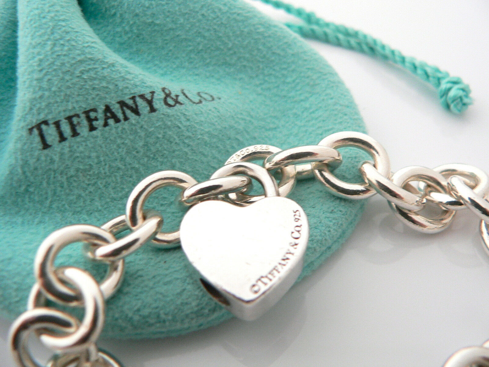 Home › Tiffany & Co Silver XOXO Heart Padlock Bracelet Bangle Charm ...
