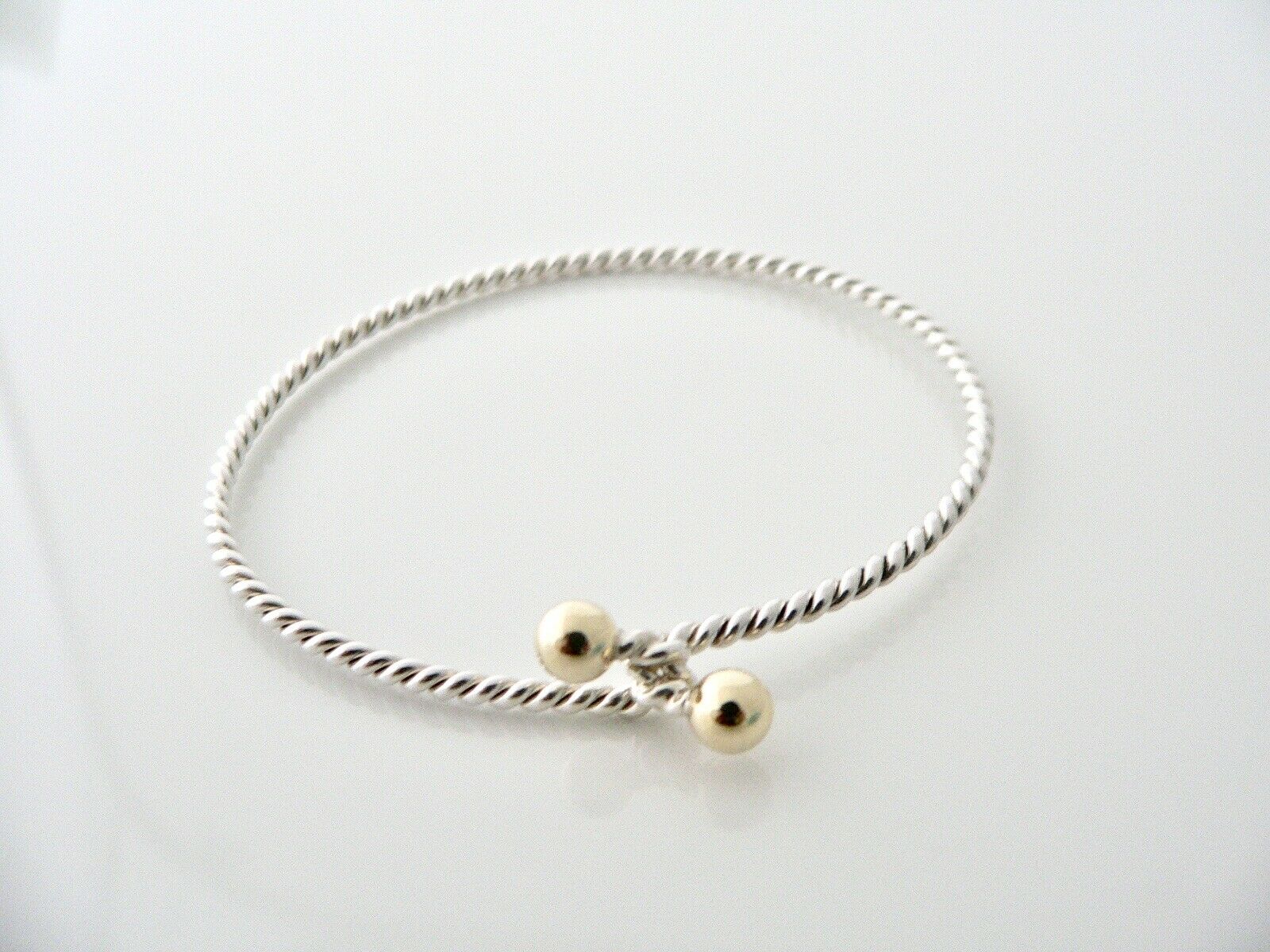 Tiffany & Co 18K Gold Silver Love Knot Bangle Hook Bracelet