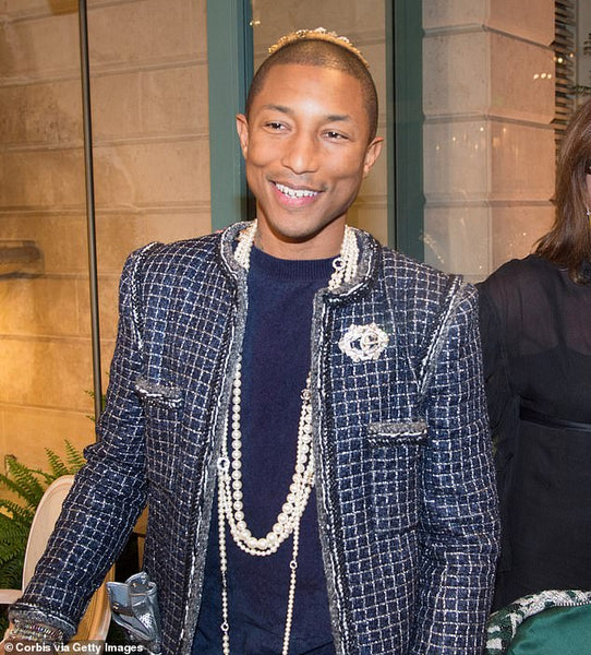 Pharrell Williams Loves Chanel Necklaces and Handbags