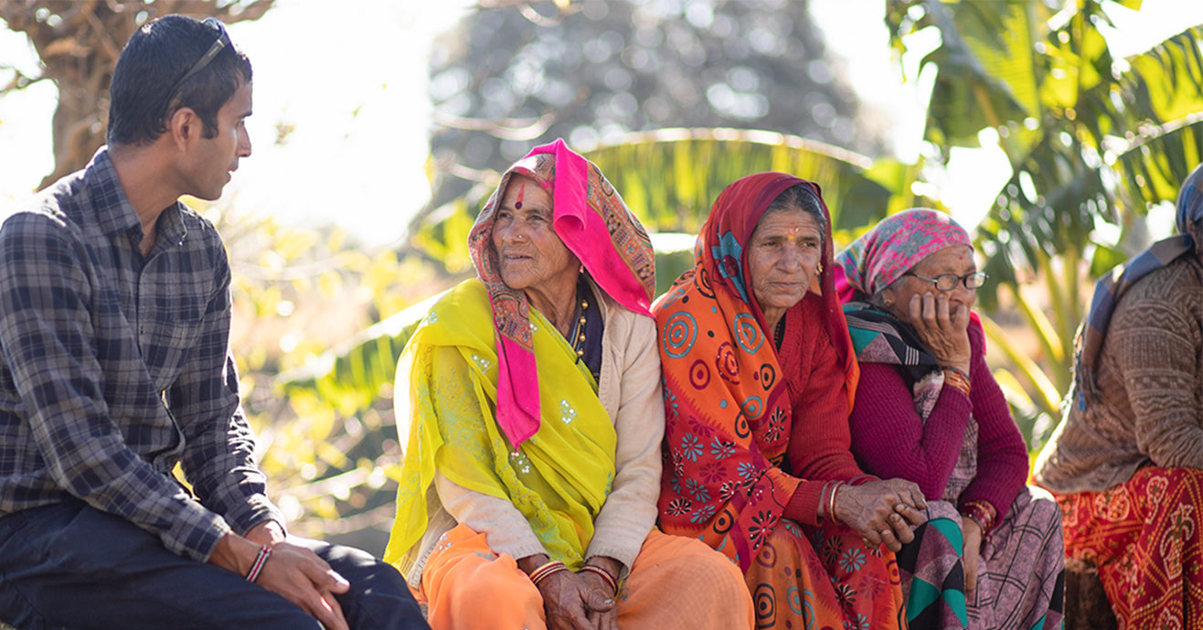 Raj Vable speaking with tea farmers in Kumaon, India