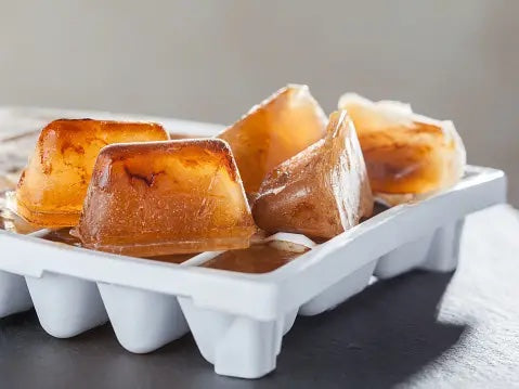 Coffee Cubes in White Ice Cube Tray on Wooden Counter