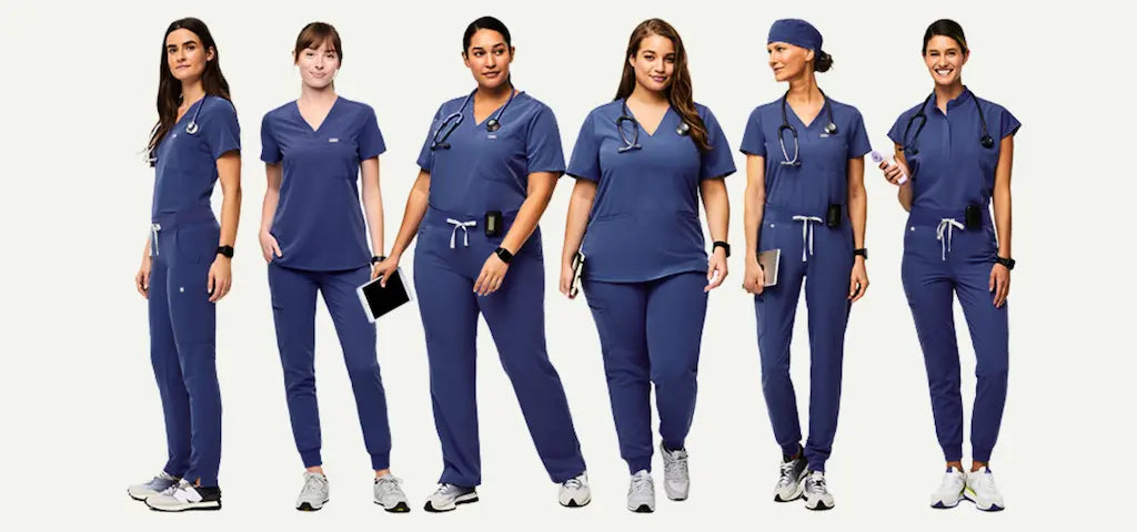 A group of female LPN's wearing Navy Blue scrub uniforms on a white background.