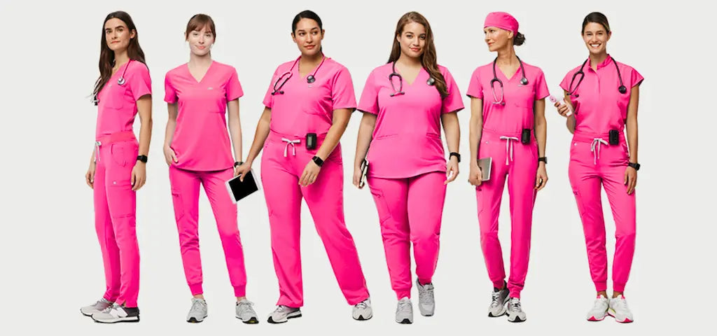 A group of female Pediatric Nurses wearing Shocking Pink Scrub Uniforms on a white background.
