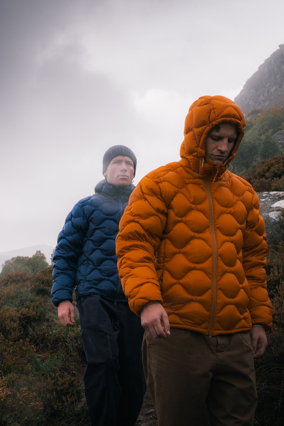 Two hikers wearing the Cuillin Down Jacket by Scottish brand KESTIN