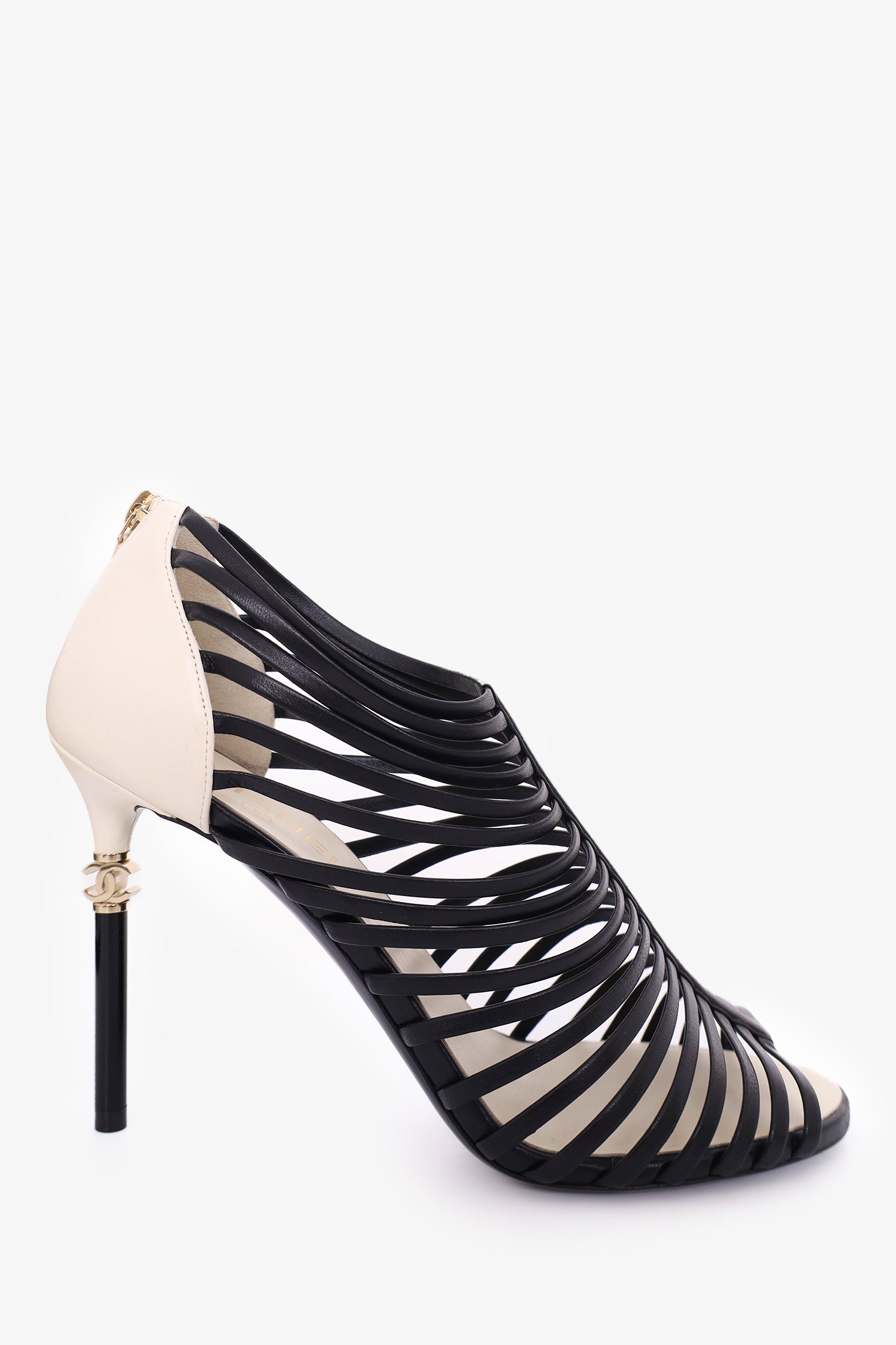 image of Pre-Loved Chanel™ Black/White Leather Strappy Heels Size 41