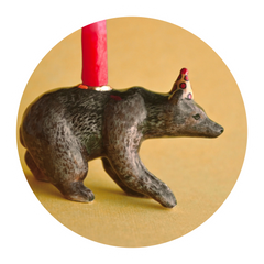 Bear Cake Topper on a yellow background