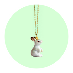 Bunny necklace on a lime green background