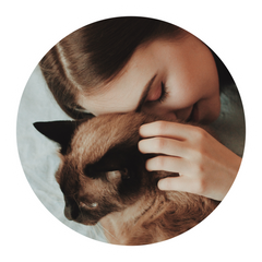 Woman with Siamese Cat