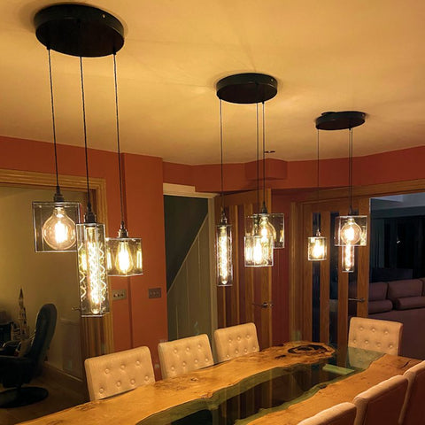 a smoked glass cluster of pendant lights 