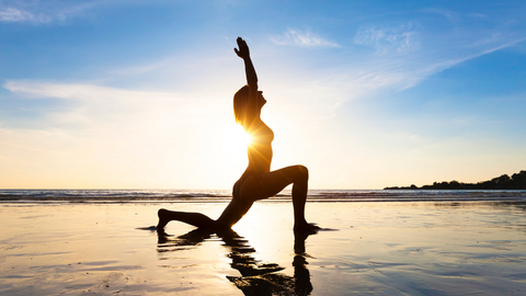 women doing yoga in the sun