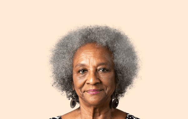 Smiling senior american african woman face