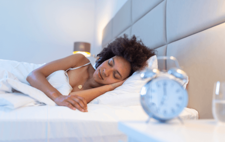 Curly afro american african woman sleeping soundly