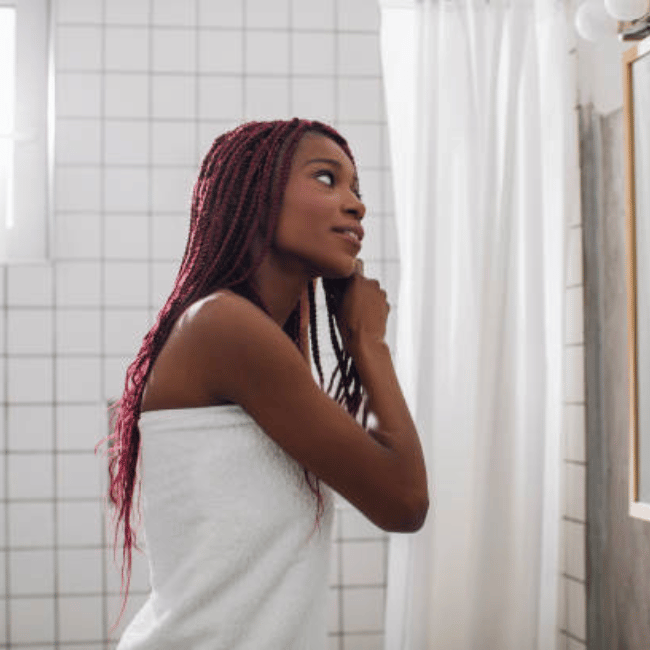 African American Girl washing her hair