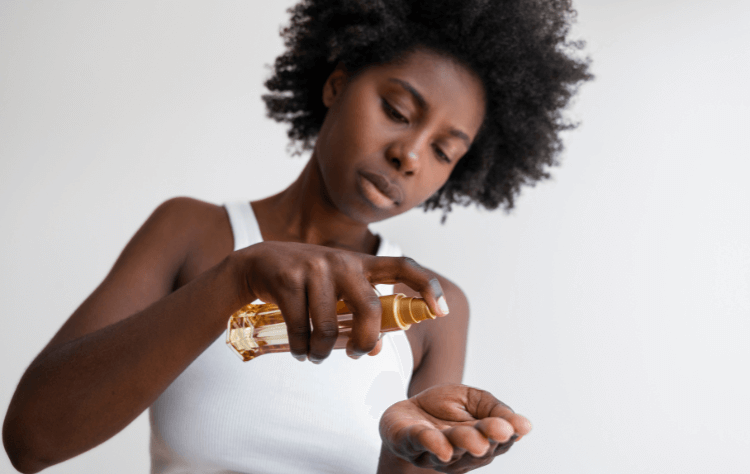 medium shot  black woman using hair product