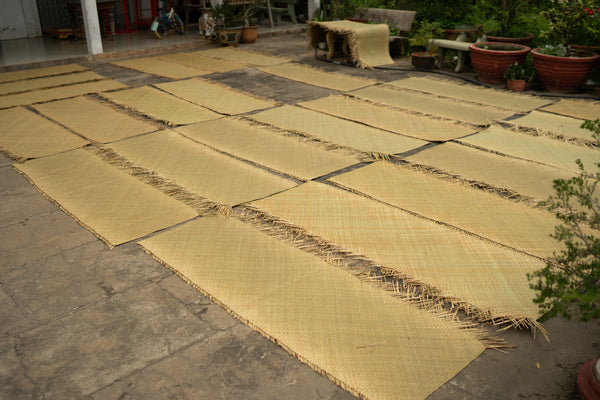 Drying Seegrass in front of the Workshop of the Artisan Group Quang Thinh in Ninh Binh in the north of Vietnam