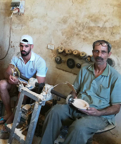 Handmade Fair Trade Olive Wood Products by Artisan Simon Sway for Holy Land Handicraft Cooperative Society Palestine 