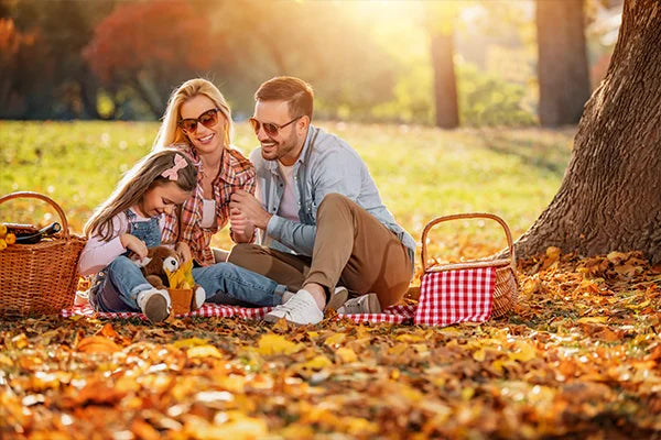 Caucasian family enjoying a fall picnic