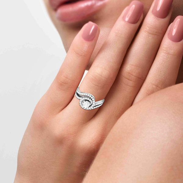 The large red diamond heart shape is surrounded by many diamonds on the ring  made of platinum gold placed on a gray background. Elegant wedding diamond  ring for women. 3d rendering 5692271