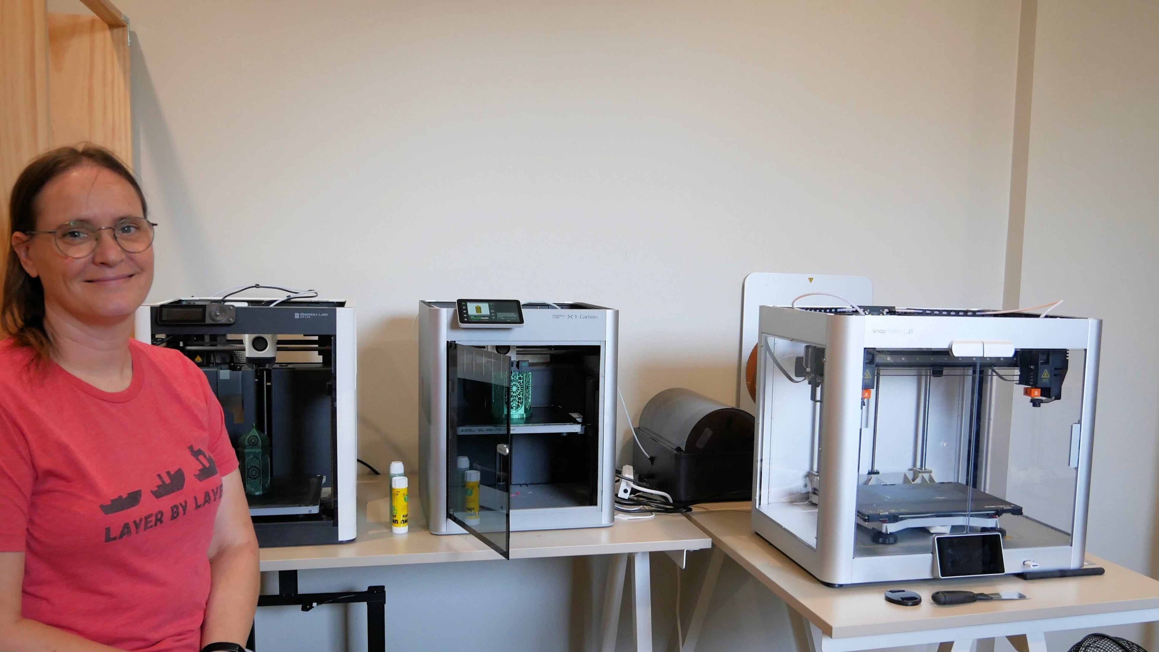 Natalie with the new additions to her collection of 3D printers.