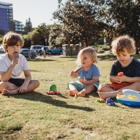 Children eating icy poles