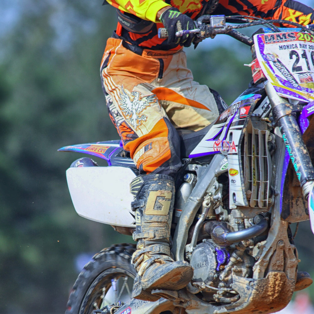 Closeup of motocross gear on rider