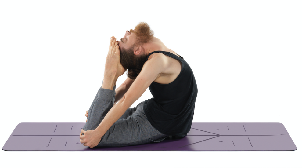 King Pigeon Pose (Rajakapotasana) is one of the best back bending yoga poses