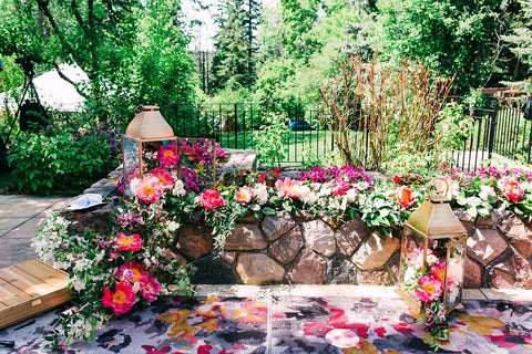 Image of floral arrangement and garland designed by FaBLOOMosity based in Edmonton, Alberta, Canada.  Photo credit: Sarah Mavro Photography