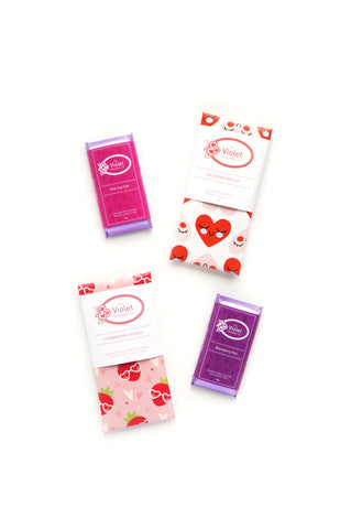 Valentine Gift - Valentine Chocolate Bar Bundle including flavoured chocolate bars. Small Bars (36g) flavours include: Blackberry Fizz (white) and Pink Sea Salt (dark milk). Big Bars (78g) flavours include: Valentine Mocha (dark) and Strawberry Crunch (milk). All products included are from the 2022 Valentine Collection from The Violet Chocolate Company, internationally award-winning chocolatier based in Edmonton, Alberta, Canada, ships across Canada, Valentine Gift
