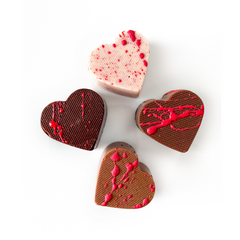 Internal link to shop Valentine 2022 Pieces Of My Heart including four heart shaped flavoured chocolate bar bites. From internationally award-winning Edmonton based Violet Chocolate Company. Valentine Gift Idea with Canada-wide shipping 